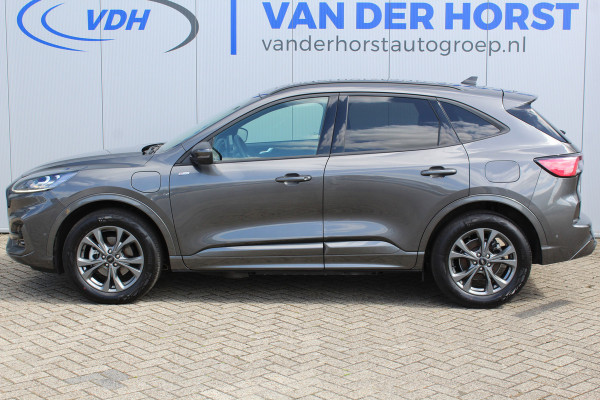 Ford Kuga 2.5-225pk Plug-in Hybrid ST-Line X. Hybride rijden voor een reële prijs ! Adaptive Cruise Control, Stoel- en voorraamverwarming, Climate Control, Metallic lak, Camera v+a, Elektr. achterklep, Side- en lane assist etc.