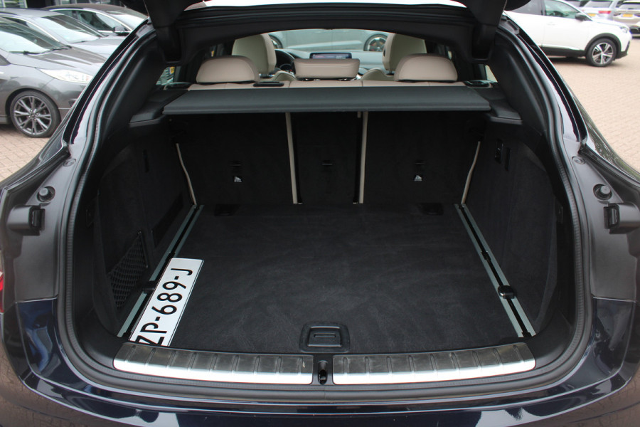 BMW X4 M40i High Executive / Trekhaak / Panoramadak / Camera / Head-up / Luxe Leder / 21'' / Harman Kardon / Navigatie / Stuur+Stoelverwarming / DAB / Dodehoek / Cruise Control