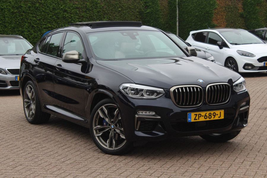 BMW X4 M40i High Executive / Trekhaak / Panoramadak / Camera / Head-up / Luxe Leder / 21'' / Harman Kardon / Navigatie / Stuur+Stoelverwarming / DAB / Dodehoek / Cruise Control