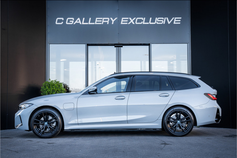 BMW 3 Serie Touring 330e xDrive - M Sport | Panorama | H&K | Memory | 360 Camera