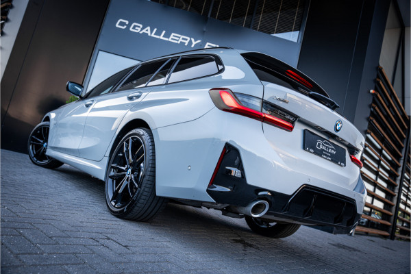 BMW 3 Serie Touring 330e xDrive - M Sport | Panorama | H&K | Memory | 360 Camera