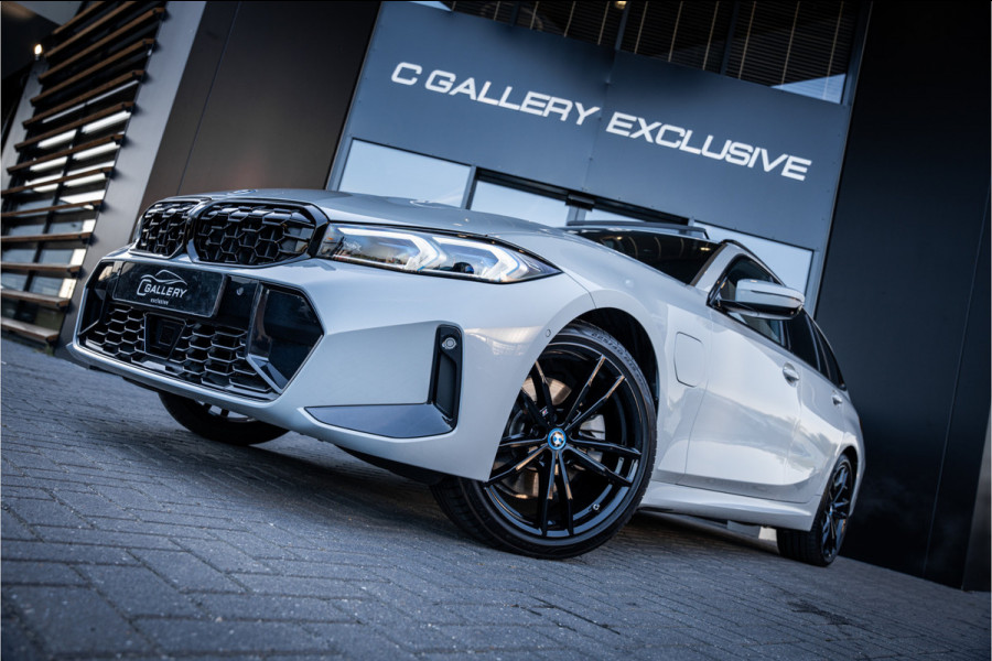 BMW 3 Serie Touring 330e xDrive - M Sport | Panorama | H&K | Memory | 360 Camera