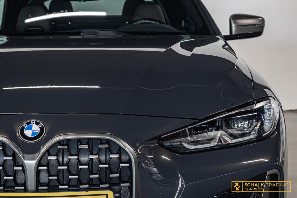 BMW 4 Serie Cabrio M440i xDrive High Ex|H&K|E-stoel|Dealer ond