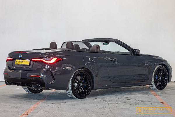 BMW 4 Serie Cabrio M440i xDrive High Ex|H&K|E-stoel|Dealer ond