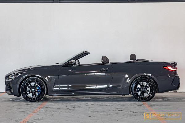 BMW 4 Serie Cabrio M440i xDrive High Ex|H&K|E-stoel|Dealer ond