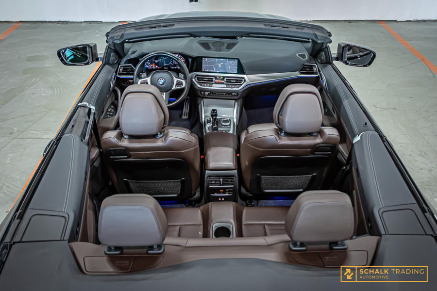 BMW 4 Serie Cabrio M440i xDrive High Ex|H&K|E-stoel|Dealer ond
