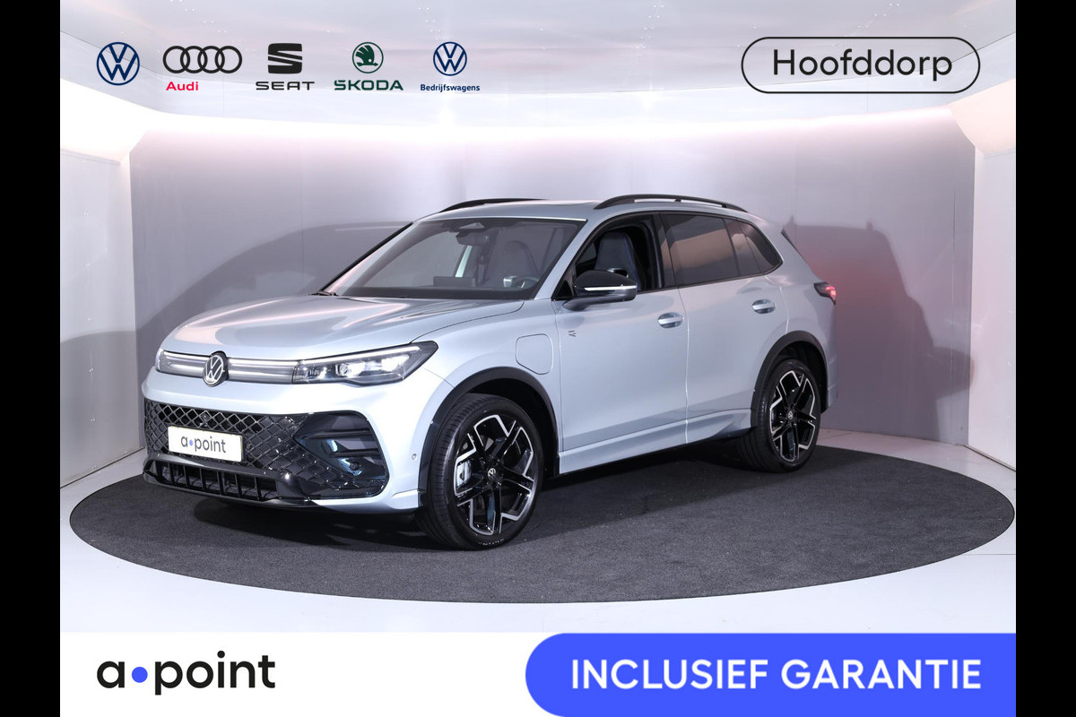 Volkswagen Tiguan 1.5 eHybrid R-Line Edition 204pk | Pano.dak| 20'LM-velgen| El.achterklep| verwarmde voorruit Volkswagen Tiguan 1.5 eHybrid R-Line Edition 204pk | Pano.dak| 20'LM-velgen| El.achterklep| verwarmde voorruit