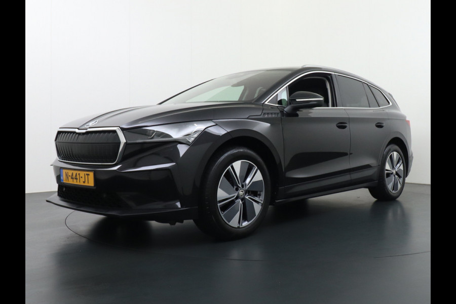 Škoda ENYAQ iV 60 180pk Trekhaak Apple Carplay Android Adap.Cruise Camera Navi Led-Matrix Lmv 19" PDC- 3-zone-Ecc Stoel+Bank-Verwarmd Keyless Stuurverwarming Voorruitverwarming Privacy Glas Rijstrooksensor met correctie 1e Eigenaar Nieuwprijs €48.865,- Trekgewicht 1.000kg Accu-Garantie tot 29-10-2029 /160dkm