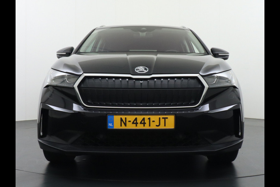 Škoda ENYAQ iV 60 180pk Trekhaak Apple Carplay Android Adap.Cruise Camera Navi Led-Matrix Lmv 19" PDC- 3-zone-Ecc Stoel+Bank-Verwarmd Keyless Stuurverwarming Voorruitverwarming Privacy Glas Rijstrooksensor met correctie 1e Eigenaar Nieuwprijs €48.865,- Trekgewicht 1.000kg Accu-Garantie tot 29-10-2029 /160dkm