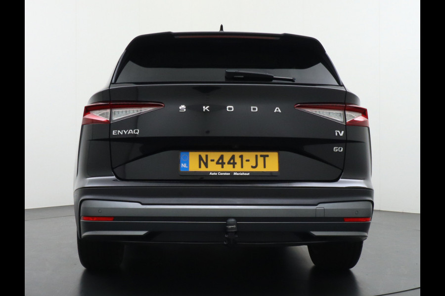 Škoda ENYAQ iV 60 180pk Trekhaak Apple Carplay Android Adap.Cruise Camera Navi Led-Matrix Lmv 19" PDC- 3-zone-Ecc Stoel+Bank-Verwarmd Keyless Stuurverwarming Voorruitverwarming Privacy Glas Rijstrooksensor met correctie 1e Eigenaar Nieuwprijs €48.865,- Trekgewicht 1.000kg Accu-Garantie tot 29-10-2029 /160dkm