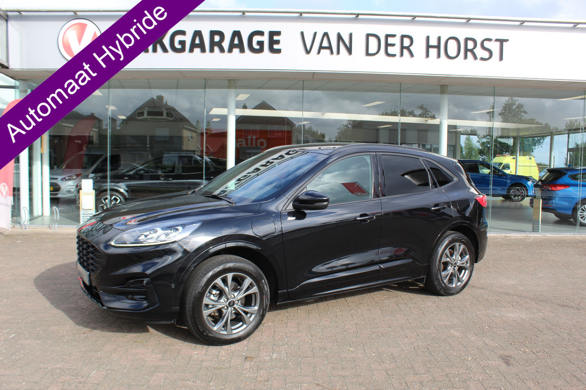 Ford Kuga 2.5-225pk Plug-in Hybrid ST-Line X. Hybride rijden voor een reële prijs ! Adaptive Cruise Control, Stoel- en voorraamverwarming, Climate Control, Metallic lak, Camera v+a, Elektr. achterklep, Side- en lane assist etc.
