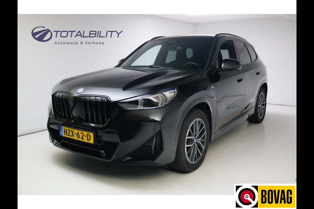 BMW X1 xDrive25e M-sport 245 PK | Stoelverwarming + massage | Stuurverwarming | Navigatie Keyless, Elektrische achterklep, Privacy glas, App-connect, Cruise, Led BMW X1 xDrive25e M-sport 245 PK | Stoelverwarming + massage | Stuurverwarming | Navigatie Keyless, Elektrische achterklep, Privacy glas, App-connect, Cruise, Led