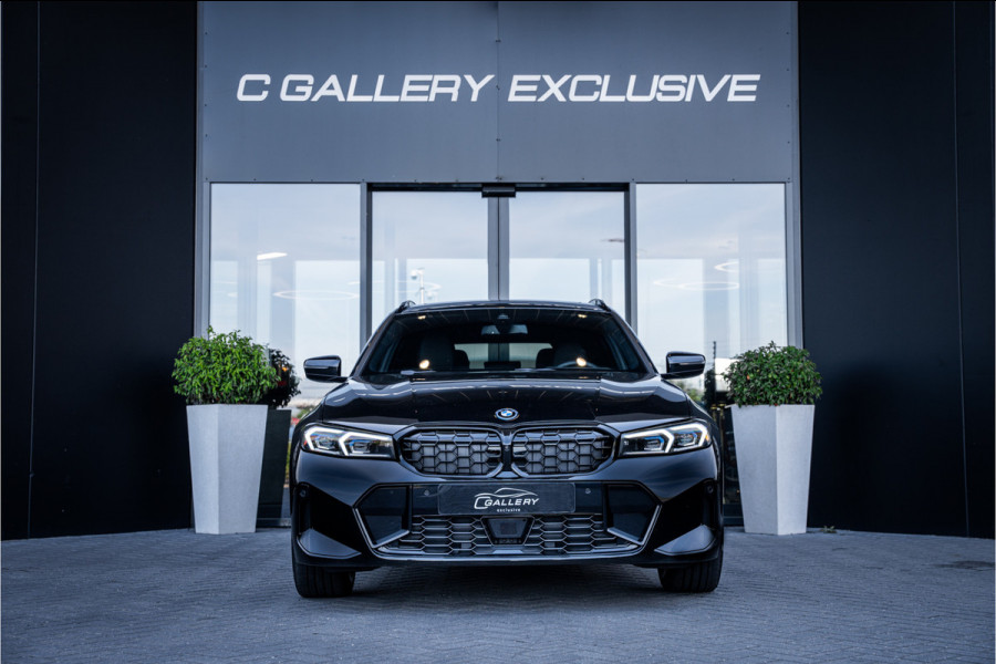 BMW 3 Serie Touring 330e xDrive - M Sport | Panorama | H&K | Memory | 360 Camera | HUD