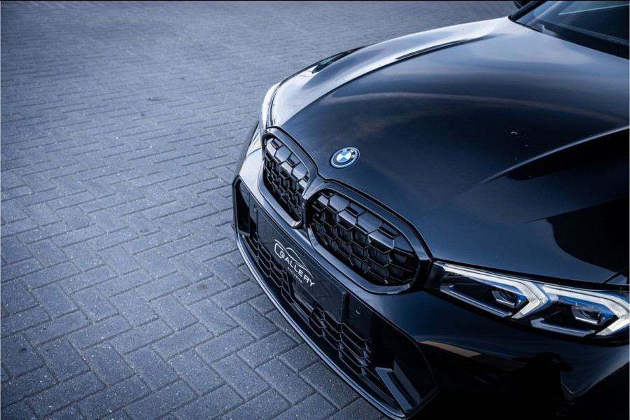 BMW 3 Serie Touring 330e xDrive - M Sport | Panorama | H&K | Memory | 360 Camera | HUD