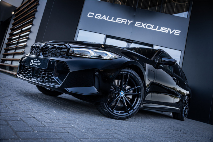 BMW 3 Serie Touring 330e xDrive - M Sport | Panorama | H&K | Memory | 360 Camera | HUD