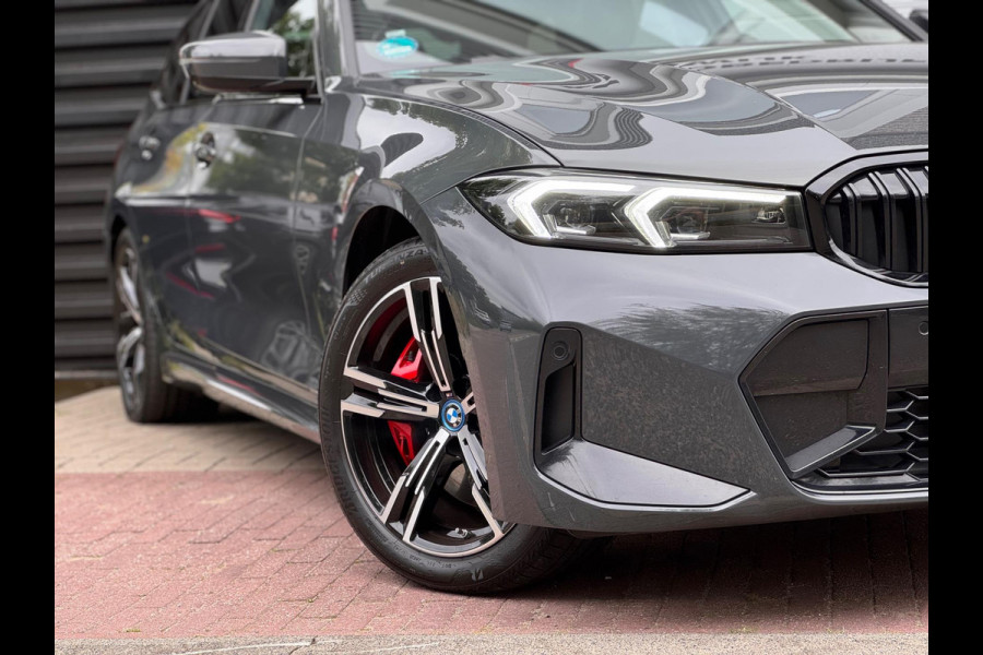 BMW 3 Serie Touring 330e Pano/Memory/H&K/360/HuD