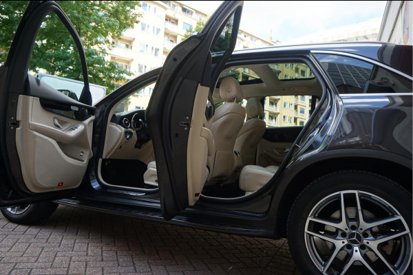 Mercedes-Benz GLC 200 Business Solution Limited | Origineel NL | Panoramadak | Trekhaak | Adaptive + Lane Departure | 360 camera | Apple Carplay | Geperforreerd lederen interieur | AMG sportvelgen