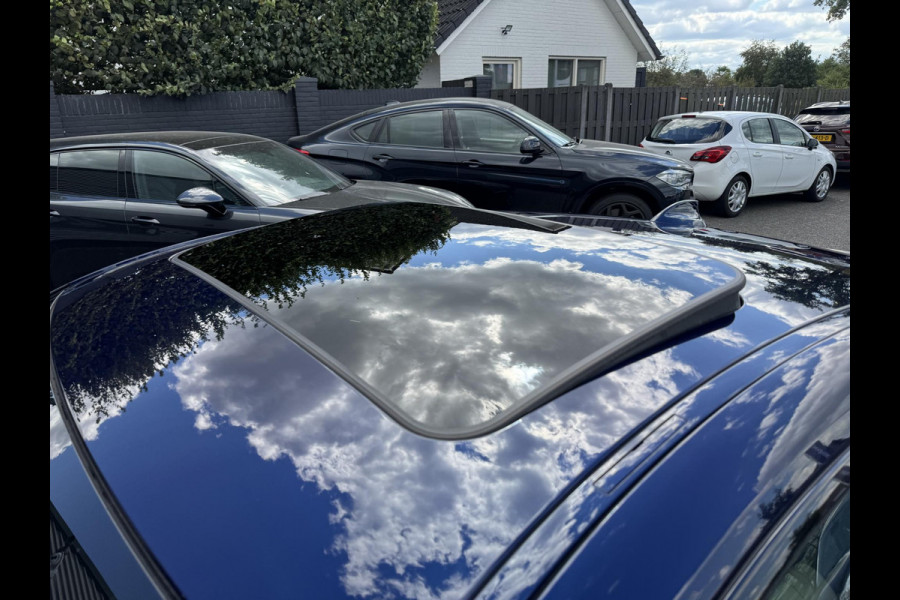BMW 4 Serie Coupé 430i High Executive M-Sport | Panoramadak | Carbon | Head-Up Display | Camera | Harmon Kardon |