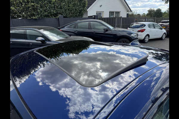 BMW 4 Serie Coupé 430i High Executive M-Sport | Panoramadak | Carbon | Head-Up Display | Camera | Harmon Kardon |