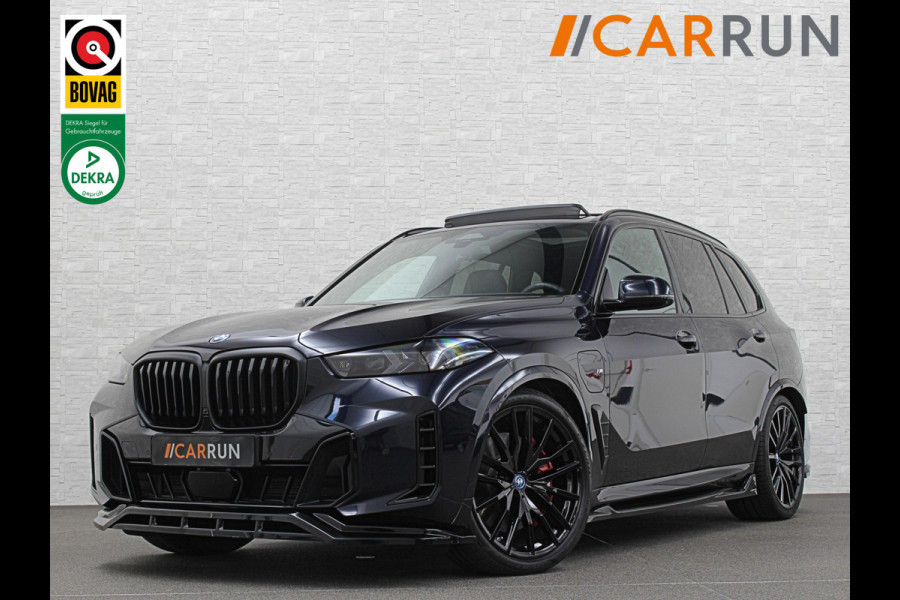 BMW X5 50e M-Performance Seats | M-Sport Pro | 360 Camera | Soft-Close | Panorama | Indiv. Leder | 4-Zone Clima | Stoelventilatie | Head-Up | Harman-Kardon | Keyless-Entry | Memory | M-Gordels | Stuurverwarming | Stoelverwarming V+A | Zonwering | Parfumering | Iso-Glas | Iconic-Glow | Beker Koeling & Verwarming | Standkachel | Carplay |
