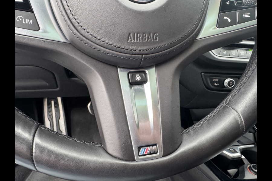 BMW 1-serie 118i High Exe M Pakket Panoramdak, Head-up, Adaptieve Cruise, DAB, trekhaak Comfort toegang .Neem contact op en we maken een afspraak!