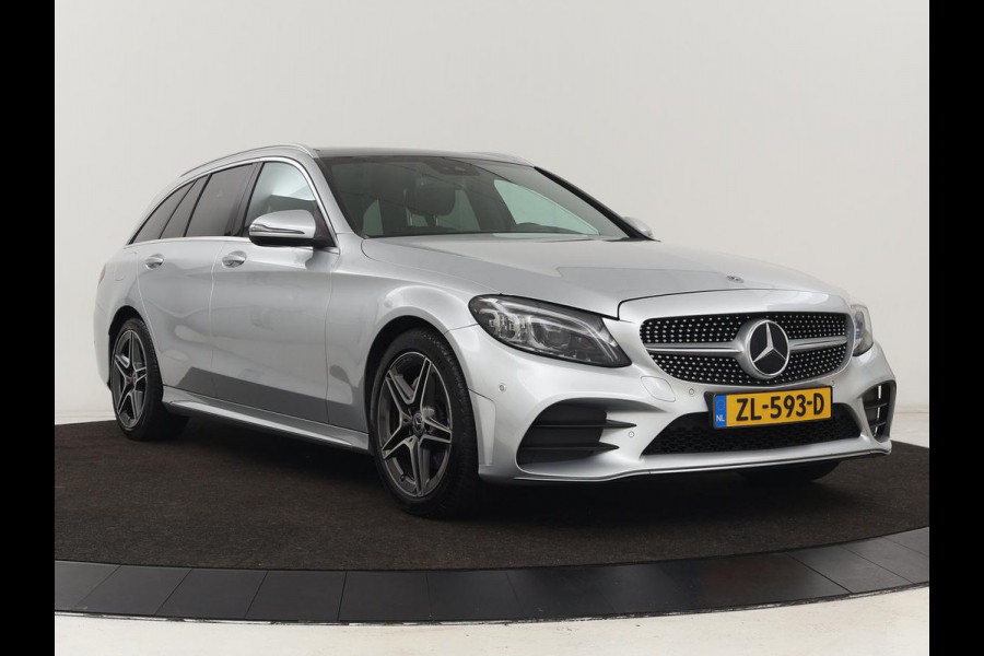 Mercedes-Benz C-Klasse 160 AMG Uprade Edition | Panoramadak | Stoelverwarming | Camera | Carplay | Leder/Alcantara | Navigatie | Digital Cockpit | Full LED | Climate control | Park Assist
