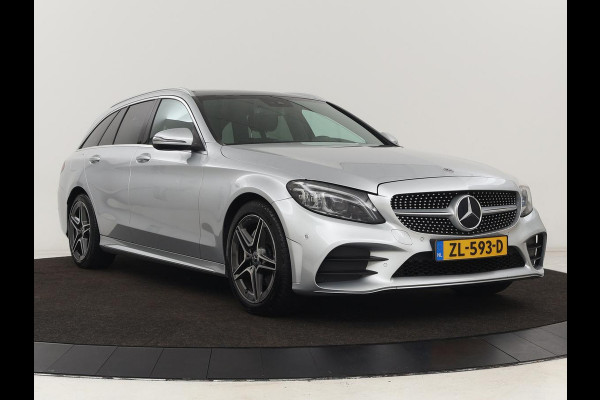 Mercedes-Benz C-Klasse 160 AMG Uprade Edition | Panoramadak | Stoelverwarming | Camera | Carplay | Leder/Alcantara | Navigatie | Digital Cockpit | Full LED | Climate control | Park Assist