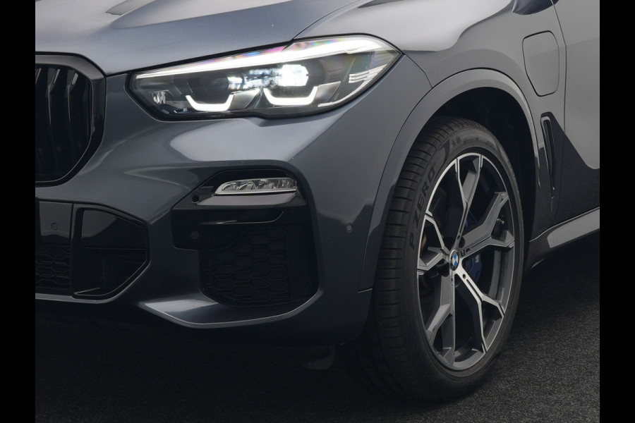 BMW X5 xDrive45e M Sport Plug in Hybrid 394pk PHEV | Trekhaak Af Fabriek | Panodak | Luchtvering | Adaptive Cruise | 360 Camera | M Sportstuur | Sfeerverlichting | Apple Carplay | Lederen Sporstoelen Memory & Verwarmd | Navigatie | DAB |