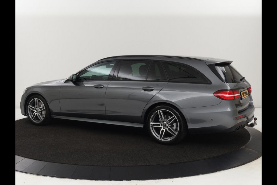 Mercedes-Benz E-Klasse 220d Business Solution AMG | Stoelverwarming | Trekhaak | Camera | Carplay | Widescreen | Half leder | Navigatie | Full LED