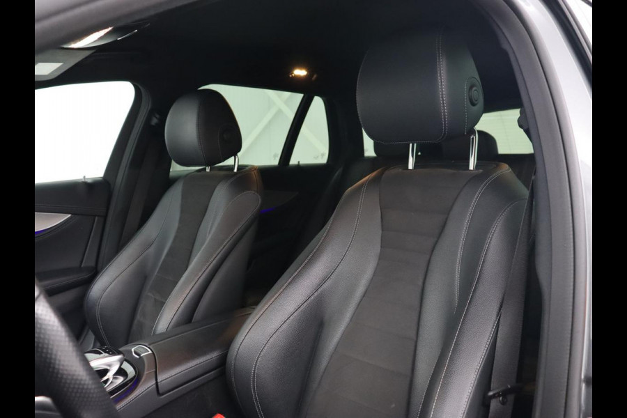 Mercedes-Benz E-Klasse 220d Business Solution AMG | Stoelverwarming | Trekhaak | Camera | Carplay | Widescreen | Half leder | Navigatie | Full LED