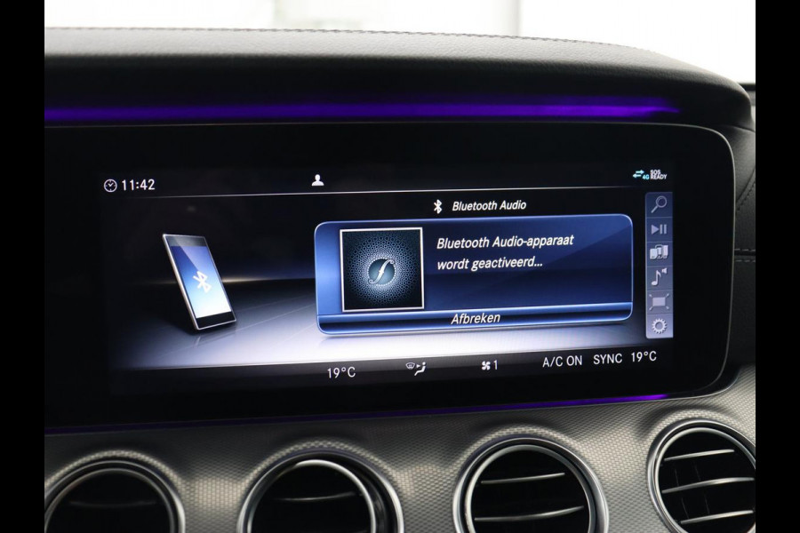 Mercedes-Benz E-Klasse 220d Business Solution AMG | Stoelverwarming | Trekhaak | Camera | Carplay | Widescreen | Half leder | Navigatie | Full LED