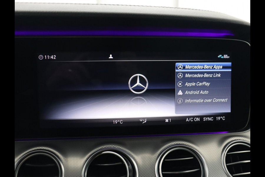 Mercedes-Benz E-Klasse 220d Business Solution AMG | Stoelverwarming | Trekhaak | Camera | Carplay | Widescreen | Half leder | Navigatie | Full LED
