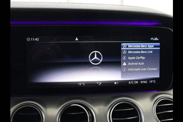 Mercedes-Benz E-Klasse 220d Business Solution AMG | Stoelverwarming | Trekhaak | Camera | Carplay | Widescreen | Half leder | Navigatie | Full LED