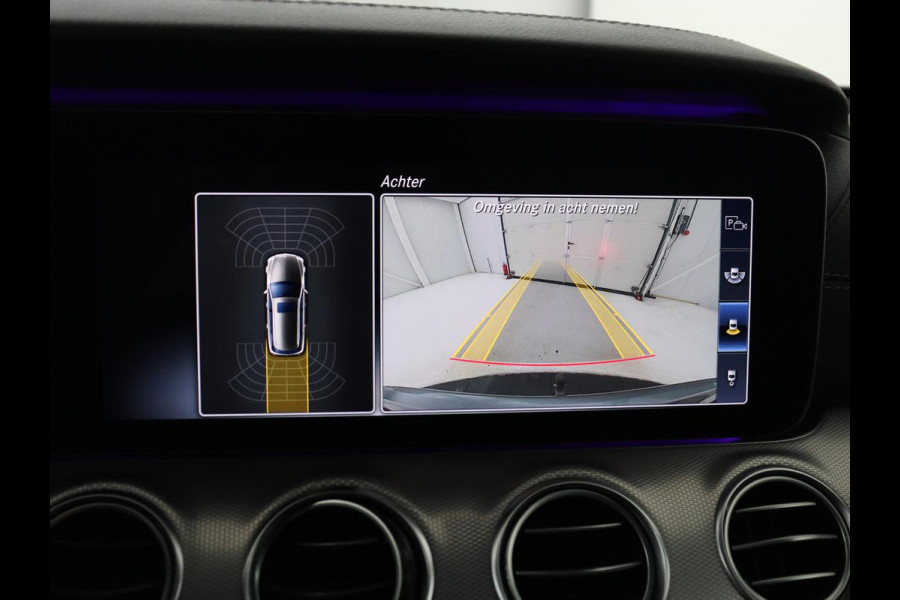 Mercedes-Benz E-Klasse 220d Business Solution AMG | Stoelverwarming | Trekhaak | Camera | Carplay | Widescreen | Half leder | Navigatie | Full LED