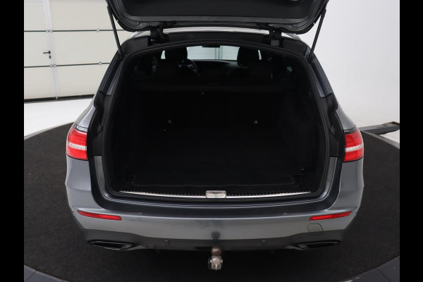 Mercedes-Benz E-Klasse 220d Business Solution AMG | Stoelverwarming | Trekhaak | Camera | Carplay | Widescreen | Half leder | Navigatie | Full LED