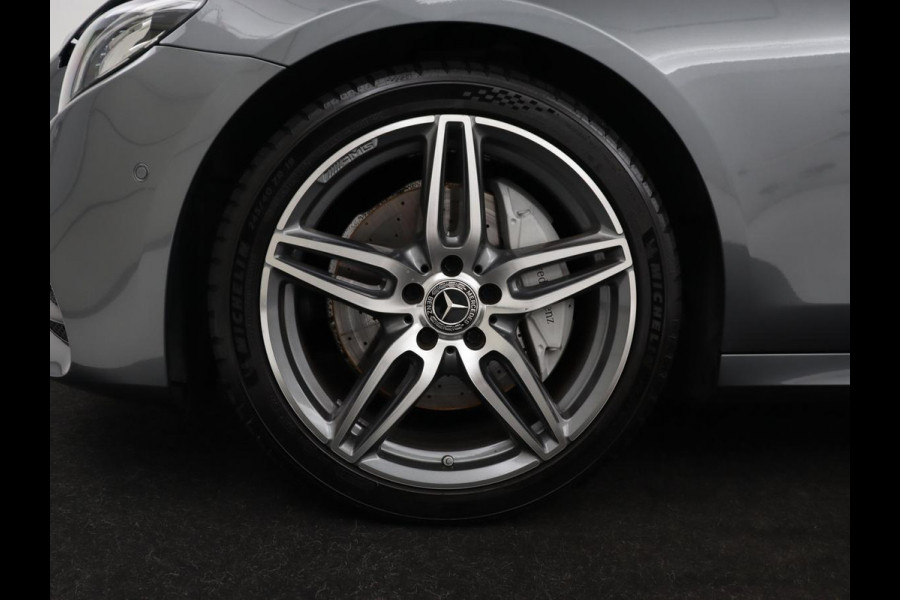 Mercedes-Benz E-Klasse 220d Business Solution AMG | Stoelverwarming | Trekhaak | Camera | Carplay | Widescreen | Half leder | Navigatie | Full LED