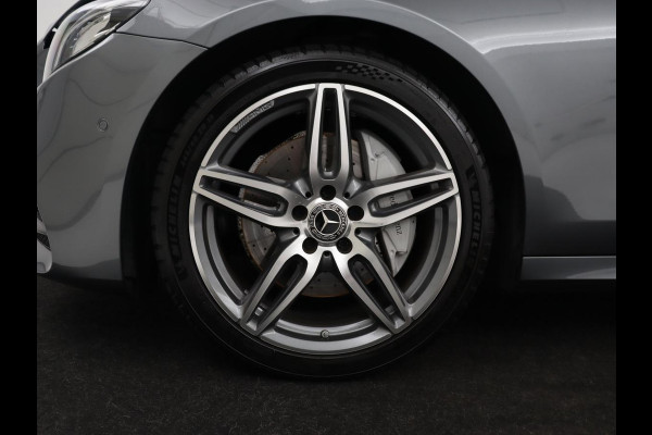 Mercedes-Benz E-Klasse 220d Business Solution AMG | Stoelverwarming | Trekhaak | Camera | Carplay | Widescreen | Half leder | Navigatie | Full LED