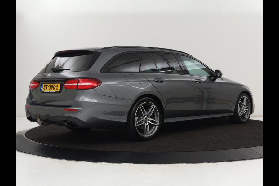 Mercedes-Benz E-Klasse 220d Business Solution AMG | Stoelverwarming | Trekhaak | Camera | Carplay | Widescreen | Half leder | Navigatie | Full LED