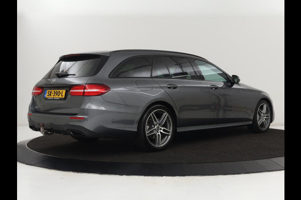 Mercedes-Benz E-Klasse 220d Business Solution AMG | Stoelverwarming | Trekhaak | Camera | Carplay | Widescreen | Half leder | Navigatie | Full LED