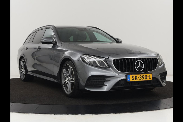 Mercedes-Benz E-Klasse 220d Business Solution AMG | Stoelverwarming | Trekhaak | Camera | Carplay | Widescreen | Half leder | Navigatie | Full LED