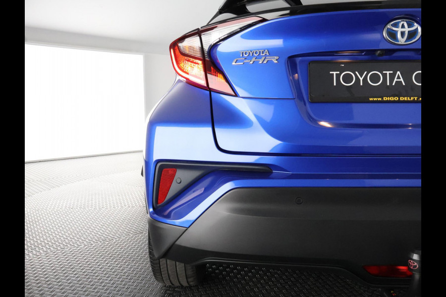 Toyota C-HR 1.8 HYBRID STYLE BI-TONE AUTOMAAT GARANTIE 2-2032 HALF LEDER. CARPLAY NAVI. 18 INCH .PDC V+A. CAMERA.