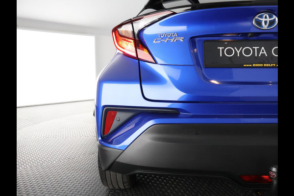 Toyota C-HR 1.8 HYBRID STYLE BI-TONE AUTOMAAT GARANTIE 2-2032 HALF LEDER. CARPLAY NAVI. 18 INCH .PDC V+A. CAMERA.