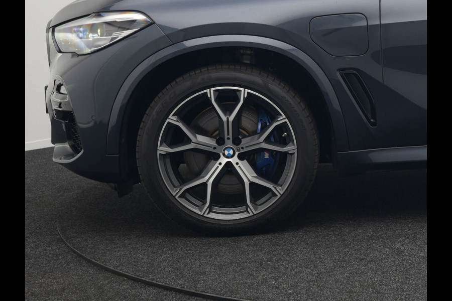 BMW X5 xDrive45e M Sport Plug in Hybrid 394pk PHEV | Trekhaak Af Fabriek | Panodak | Luchtvering | Adaptive Cruise | 360 Camera | M Sportstuur | Sfeerverlichting | Apple Carplay | Lederen Sporstoelen Memory & Verwarmd | Navigatie | DAB |