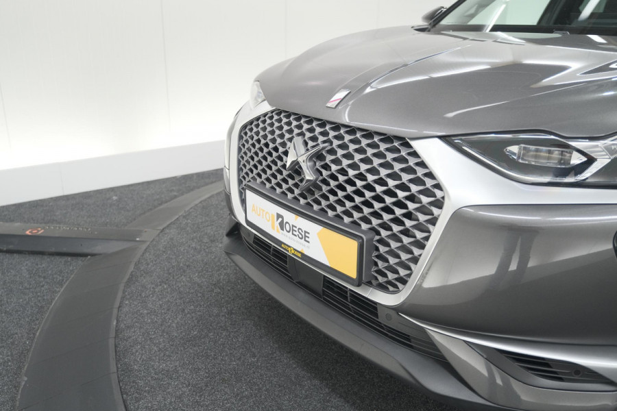 DS DS 3 Crossback 50 kwh e-Tense So Chic | Camera | Dodehoekdetectie | Head-Up Display | Apple Carplay | Stoelverwarming DS DS 3 Crossback 50 kwh e-Tense So Chic | Camera | Dodehoekdetectie | Head-Up Display | Apple Carplay | Stoelverwarming