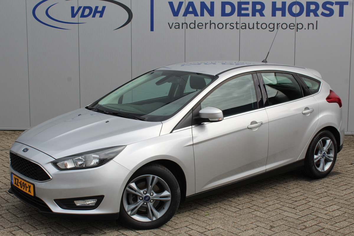 Ford Focus 1.0-125pk Titanium. Keurig nette Ford Focus hatchback met slechts 69.000km ! Autm. airco dual, cruise control, metallic lak, LM wielen, Ford Focus 1.0-125pk Titanium. Keurig nette Ford Focus hatchback met slechts 69.000km ! Autm. airco dual, cruise control, metallic lak, LM wielen,