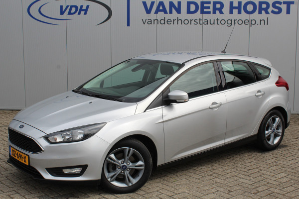 Ford Focus 1.0-125pk Titanium. Keurig nette Ford Focus hatchback met slechts 69.000km ! Autm. airco dual, cruise control, metallic lak, LM wielen,