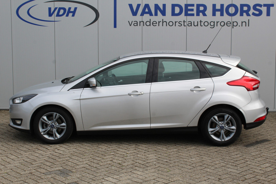 Ford Focus 1.0-125pk Titanium. Keurig nette Ford Focus hatchback met slechts 69.000km ! Autm. airco dual, cruise control, metallic lak, LM wielen,