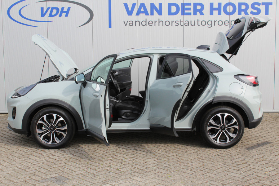 Ford Puma 1.0-125 pk EcoBoost Mild-Hybrid Titanium. Nieuw Model ! Fabrieksgarantie t/m 26-03-2029 ! Slechts 4.000km ! Stoel-, stuur- en voorraamverwarming, Side- en Lane assist, Adaptieve cruise control, Trekhaak afneembaar, LM wielen, Navigatie, telefoonvoorb.