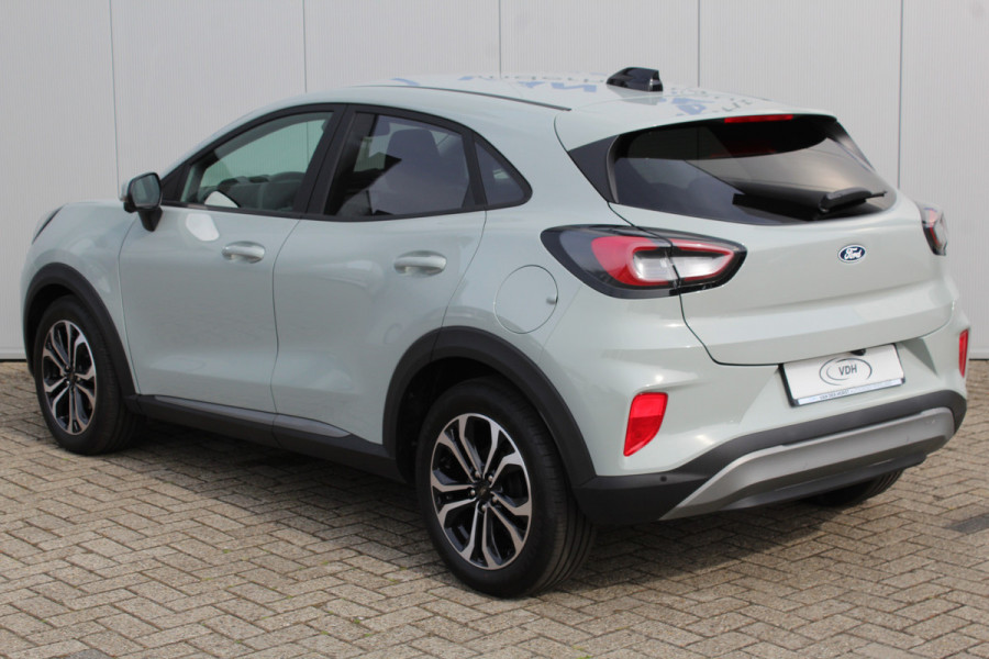Ford Puma 1.0-125 pk EcoBoost Mild-Hybrid Titanium. Nieuw Model ! Fabrieksgarantie t/m 26-03-2029 ! Slechts 4.000km ! Stoel-, stuur- en voorraamverwarming, Side- en Lane assist, Adaptieve cruise control, Trekhaak afneembaar, LM wielen, Navigatie, telefoonvoorb.