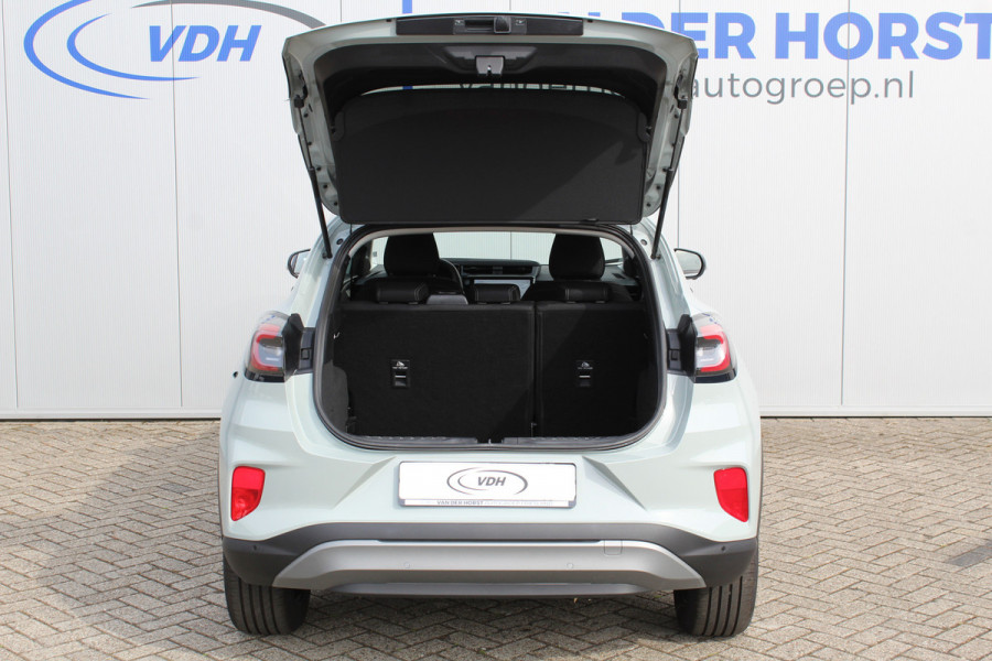 Ford Puma 1.0-125 pk EcoBoost Mild-Hybrid Titanium. Nieuw Model ! Fabrieksgarantie t/m 26-03-2029 ! Slechts 4.000km ! Stoel-, stuur- en voorraamverwarming, Side- en Lane assist, Adaptieve cruise control, Trekhaak afneembaar, LM wielen, Navigatie, telefoonvoorb.